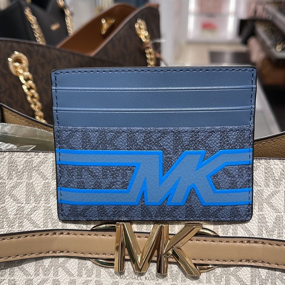 Michael Kors Cooper Graphic Logo Tall Card Case Denim Multi 36S3LCOD2B
NWT - Picture 3 of 16